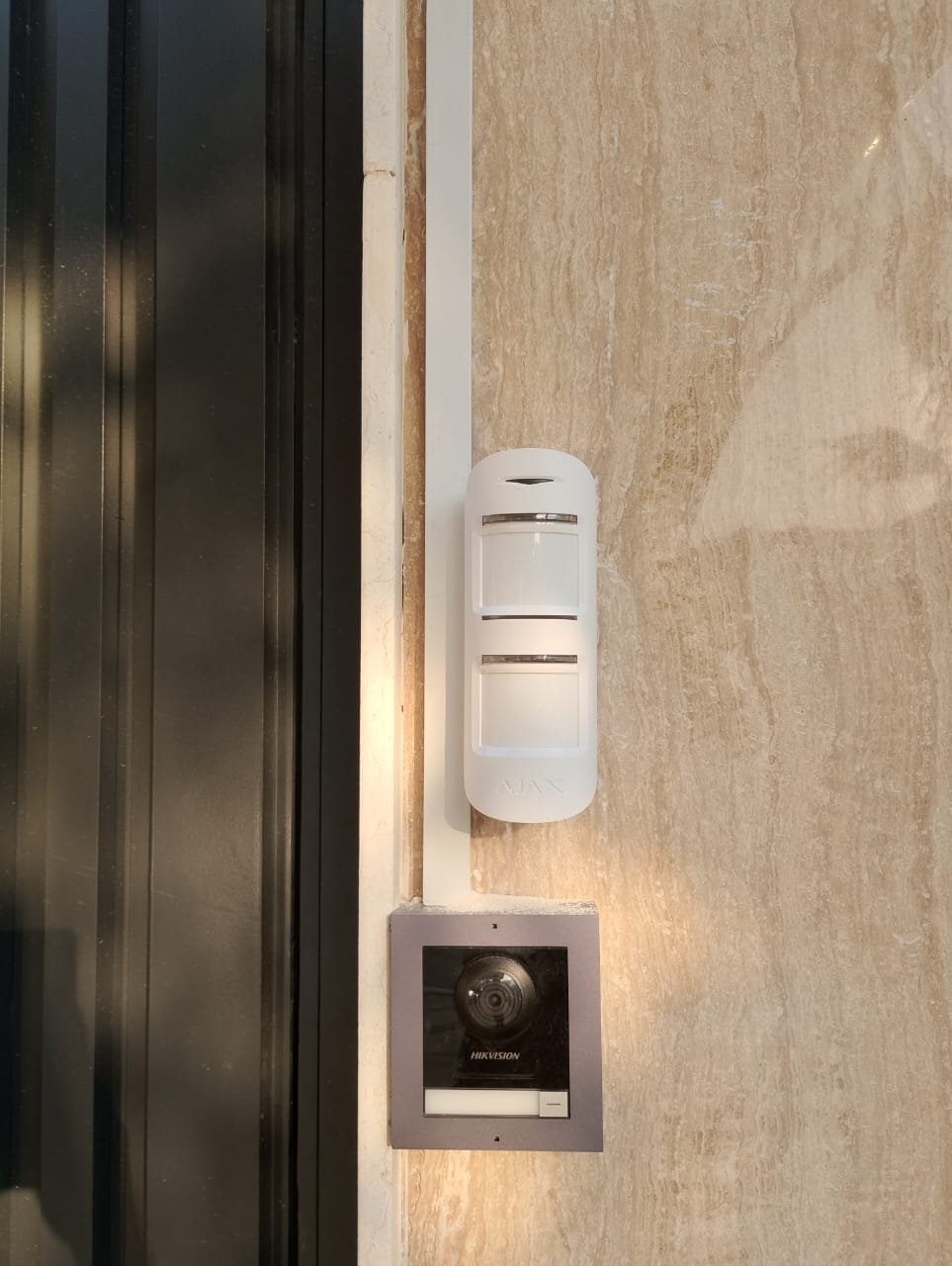 Ajax PIR motion sensor and Hikvision video doorbell villa entrance Ajman UAE